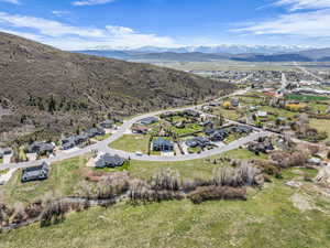 Aerial perspective of suburban area with mountains