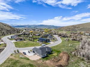 Aerial view of residential area with mountains