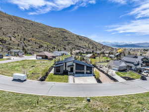 Aerial view of residential area with a mountain backdrop