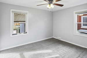 Bedroom featuring carpet floors and a ceiling fan