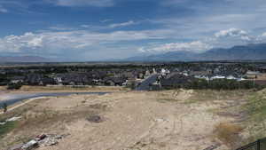 Mountain view featuring nearby suburban area