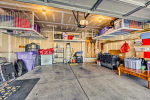 Garage with fridge and a garage door opener
