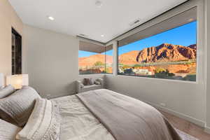 Bedroom featuring a mountain view and recessed lighting