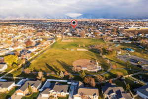 Aerial overview of property's location featuring nearby suburban area