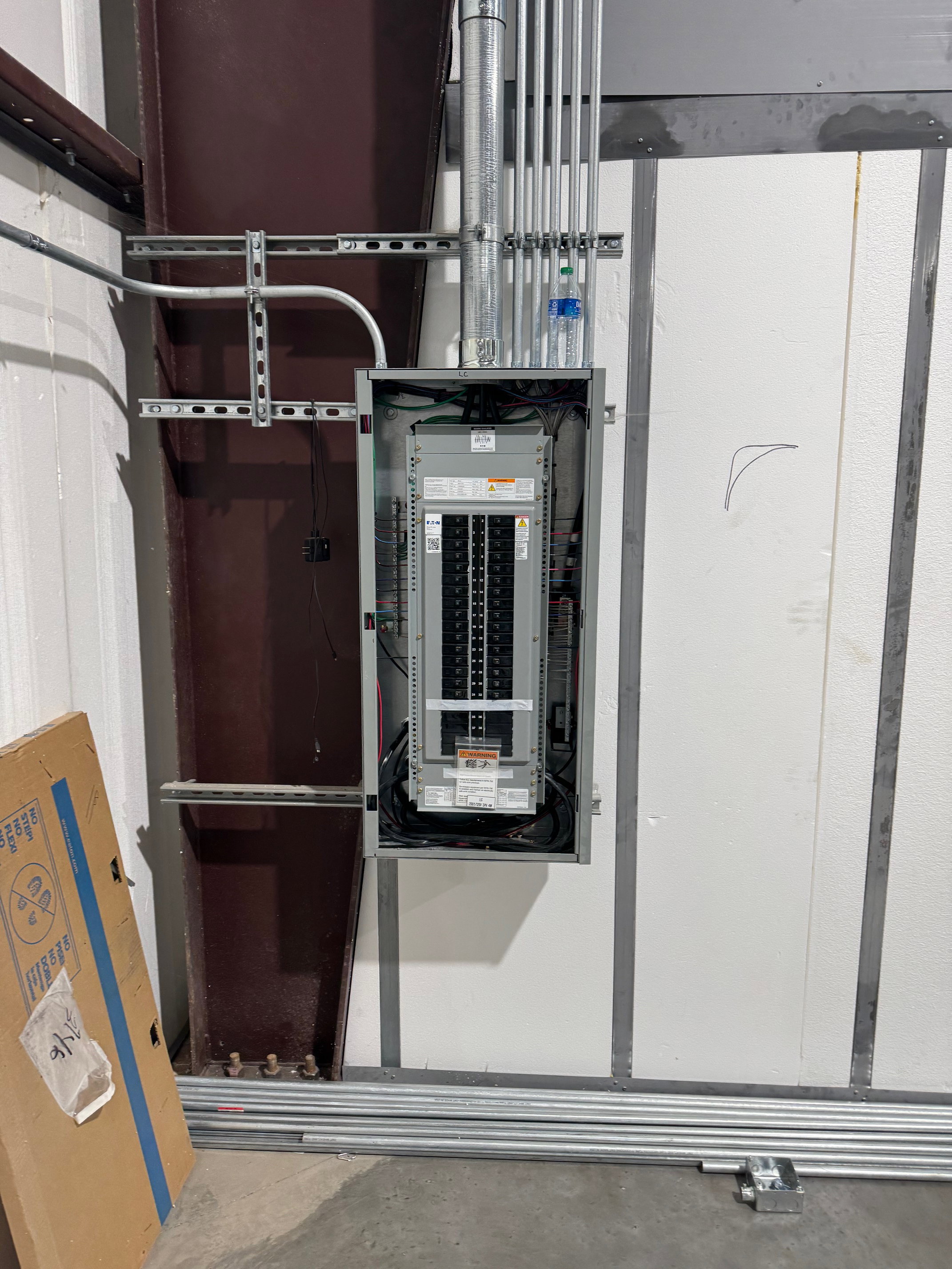 Utility room featuring electric panel