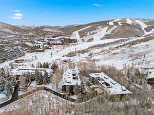 Snowy aerial view with a mountain view