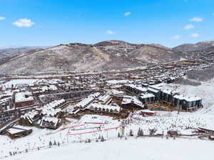 Snowy aerial view with a mountain view