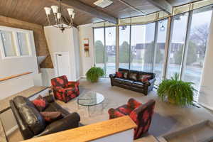 Sunroom with a chandelier