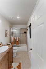 Full bath with vanity and shower/bath.