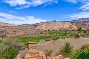 View of mountain backdrop featuring a local golf course