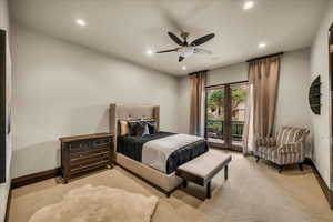 Carpeted bedroom featuring access to exterior, recessed lighting, and ceiling fan