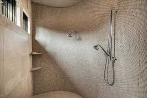 Bathroom with a tile shower