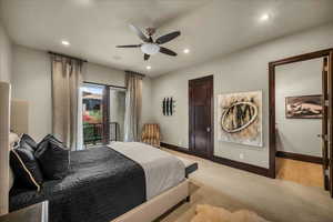 Bedroom featuring carpet floors, access to exterior, recessed lighting, and a ceiling fan