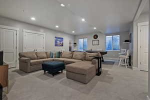 Living room featuring recessed lighting, light colored carpet, and pool table