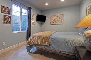 Bedroom with carpet and recessed lighting