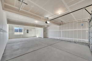 Garage featuring electric panel