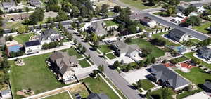 Aerial overview of property's location with nearby suburban area
