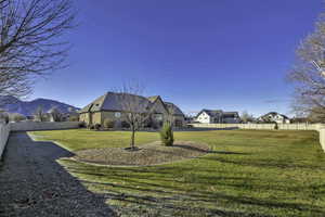 View of fenced backyard