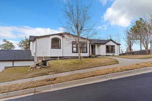 View of front of home with a front yard