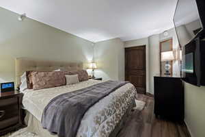 Bedroom featuring wood finish floors