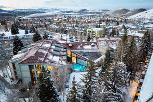 Snowy aerial view with a mountain view