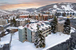Snowy aerial view with a mountain view