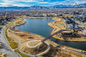 Aerial view of residential area featuring a water and mountain view