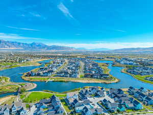 Aerial view of residential area featuring a water and mountain view