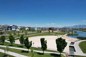View of home's community featuring a residential view and a water view