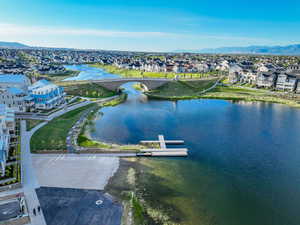 Aerial perspective of suburban area with a water and mountain view
