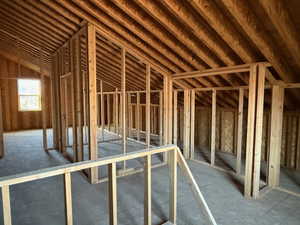 Miscellaneous room with vaulted ceiling