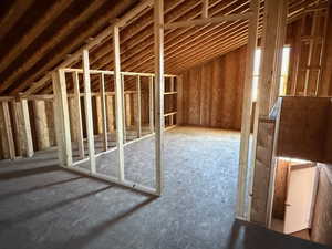 Misc room featuring vaulted ceiling