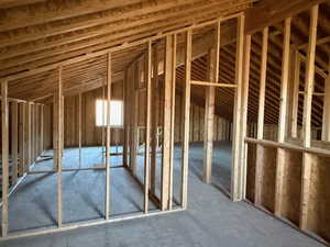 Miscellaneous room with vaulted ceiling