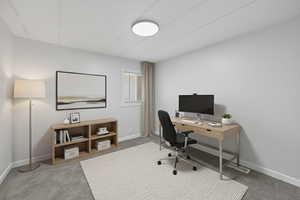 Office area featuring light carpet and baseboards Virtual staged