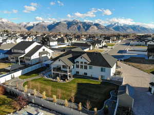 Aerial perspective of suburban area with a mountain backdrop