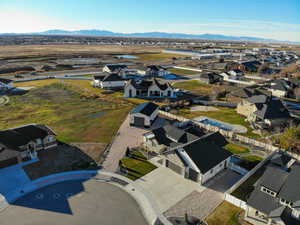 Aerial view of residential area with a water and mountain view