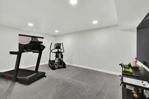 Workout room featuring recessed lighting and carpet floors