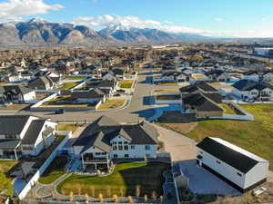 Aerial perspective of suburban area with a mountainous background
