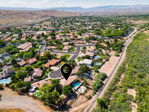 Aerial perspective of suburban area with mountains
