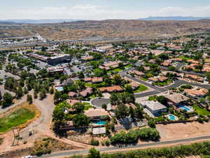 Aerial perspective of suburban area with a mountain backdrop