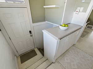 Washroom with light floors