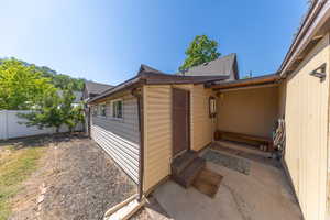View of home's exterior featuring a shingled roof