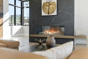 Detailed view of a premium fireplace and wood finished floors