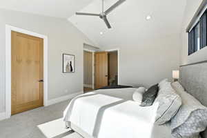 Bedroom featuring lofted ceiling, carpet, a ceiling fan, and recessed lighting