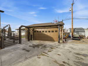 Garage with concrete driveway