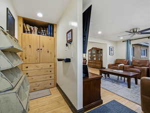 Mudroom with ceiling fan, light wood-style flooring, and recessed lighting