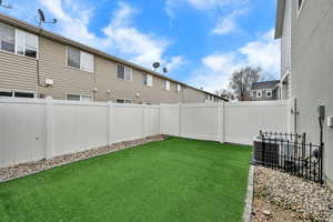 View of fenced backyard