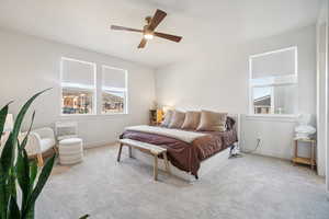 Bedroom featuring carpet flooring and ceiling fan