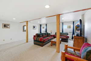 Living room featuring carpet floors and recessed lighting