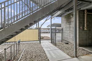 View of patio with a gate